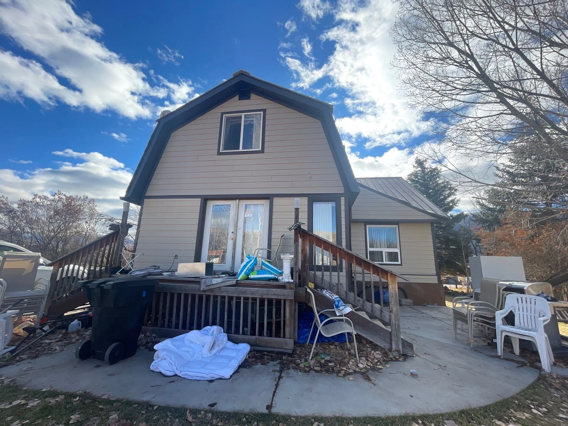 Home exterior with horizontal siding and dark roofline trim